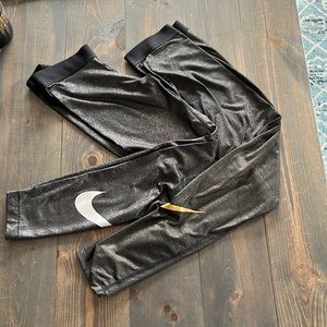 2 pairs metallic Nike leggings